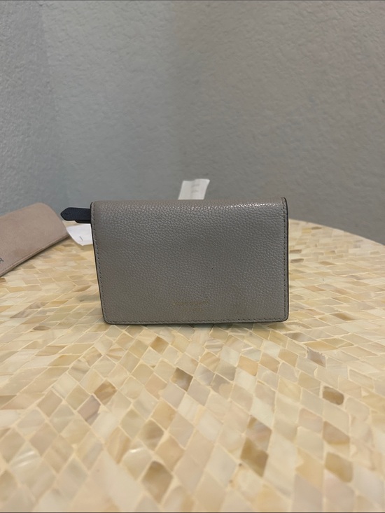 kate spade Handbags - kate spade Gray Pebble Leather Bifold Wallet